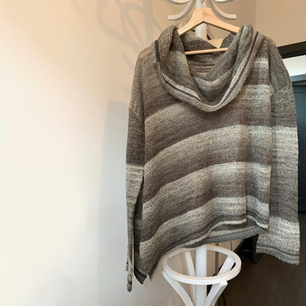 wool sweater with cowl neck and asymmetrical hem